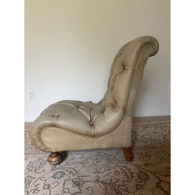 Dimensions: 21"W x 25.5"D x 31"H Seat Height: 13"H Vintage tufted leather fireside chair, French, circa 1950s. Beautiful...