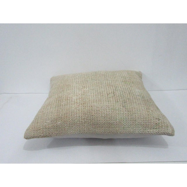 Decorative pillow cover made from a vintage Turkish handknotted rug. Backed with good quality cotton fabric. Pillow...