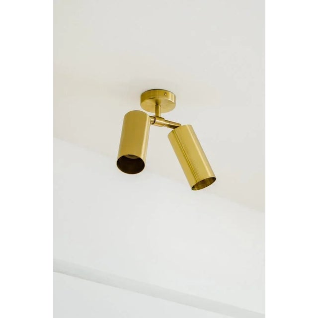 Book xl double wall light by contain dimensions: d6 x w6 x h41.5 cm materials: brass. Available in different finishes. All...