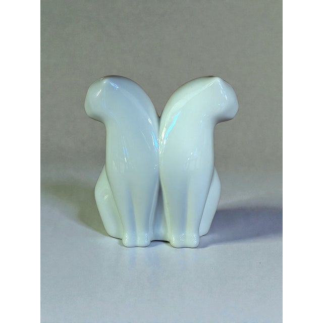 Danish Bing & Grondahl sculpture of two cats, model 4201, designed by Agnethe Jorgensen. The white porcelain cats have a...
