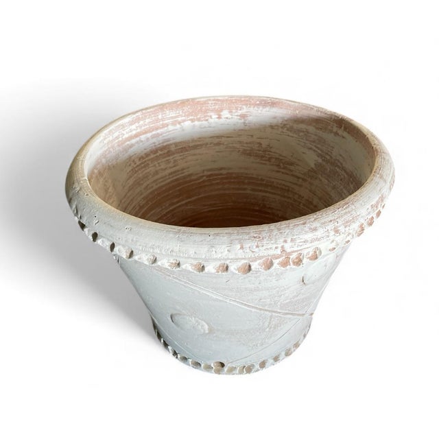 Elevate your garden or interior space with this striking artisanal planter from Tunisia. Originally crafted in traditional...