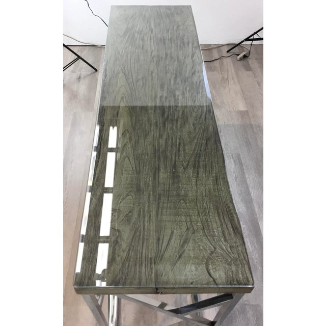 Stylish industrial modern reclaimed teak wood and stainless steel console table, glass top, showroom floor sample