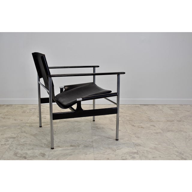 Charles Pollcok model 657 leather and steel framed sling chair designed for Knoll circa the 1970s. Original leather sling...