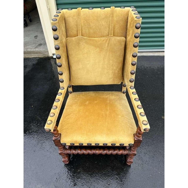 A handsome Spanish Revival armchair crafted circa 1920s–1930s in the Spanish Colonial / Spanish Revival style, featuring...
