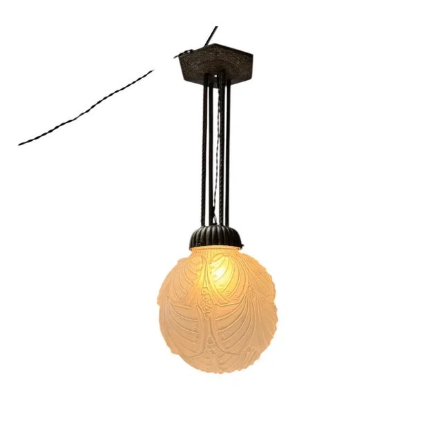 Stunning and elegant Art Deco pendant lamp. Design in the style of Muller Frères Luneville. Striking French design from...