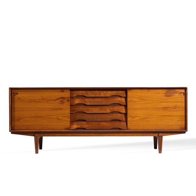 Henry Rosengren Hansen for Dyrlund Mid Century Danish Teak Credenza This credenza measures: 86.5 wide x 18.5 deep x 32.25...