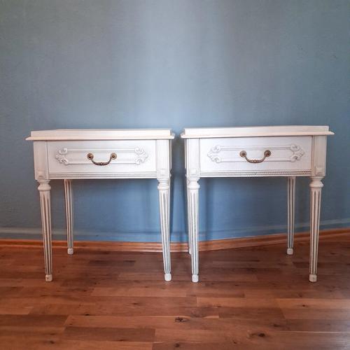 Elegant pair of French bedside tables in the Louis XVI style with a decorative crackle lacquer finish. The slender fluted...
