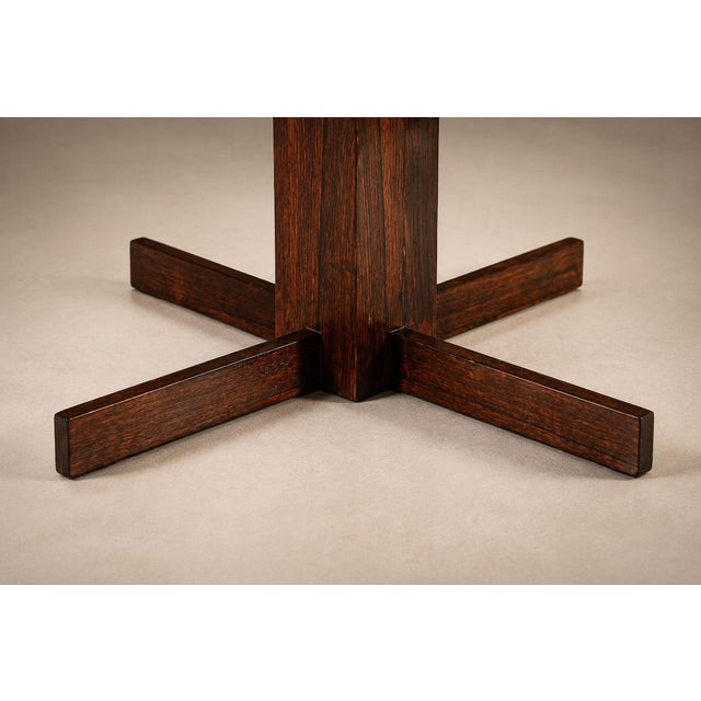 An iconic 1960s Brazilian modern dining table designed by Jean Gillon for Celina Decorações, crafted in richly figured...