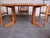 A set of four chairs and a table, high quality, made of solid pine wood. The table is round with a diameter of 110 cm,...