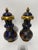 A decorative pair of 19th century English lidded vases in the Brighton Pavilion taste, turned in wood and finished with a...