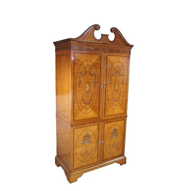 Exquisite Drexel Heritage Devoncourt Adams Style TV Armoire, circa 1980s Made from mahogany with elegant matchbook...