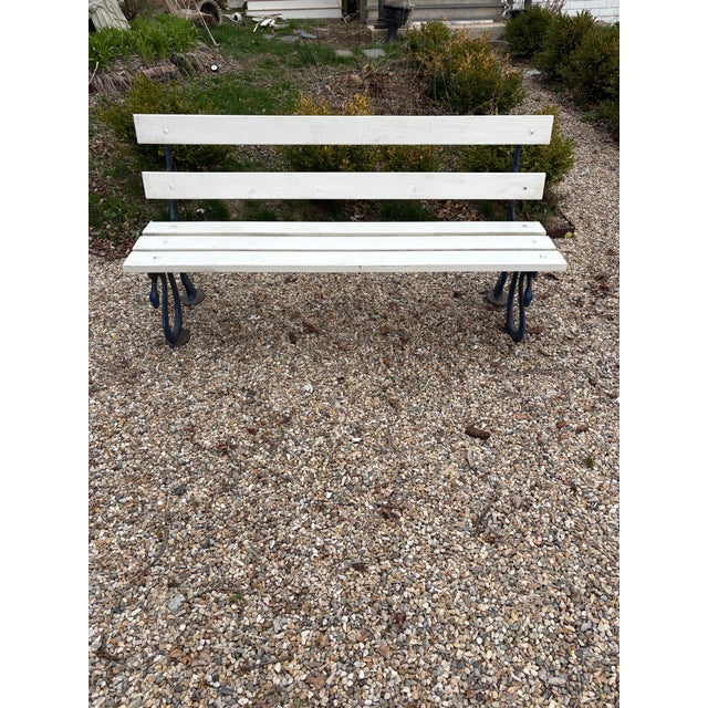 What a beautiful and rare find! The slats have been replaced. The iron snakes are in great structural condition and are...