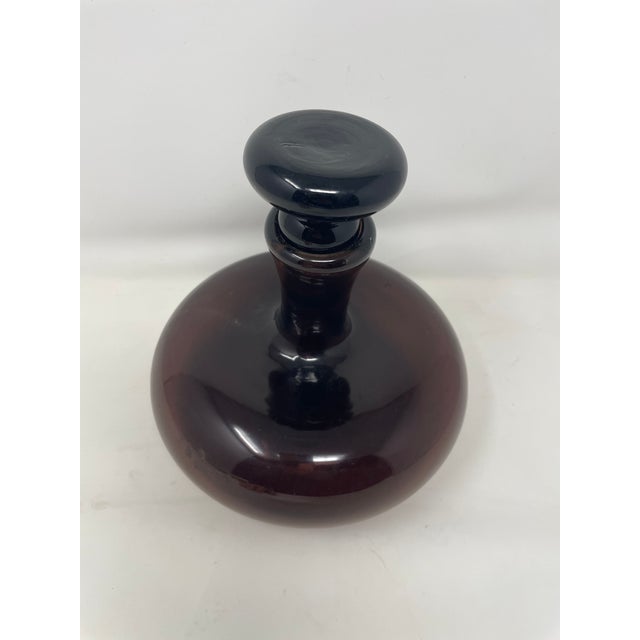 One of two ship shaped mid century decanter listed on. my account. Blown glass standing 7.5"tall.