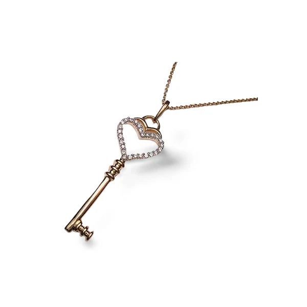 14K Yellow Gold Diamond Club Key Pendant. This exquisite piece combines the timeless elegance of yellow gold with the...