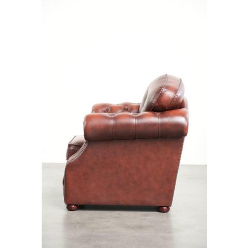 2000 - 2009 Cowhide Chesterfield Armchair in a Warm Brown Color Scheme For Sale - Image 5 of 13
