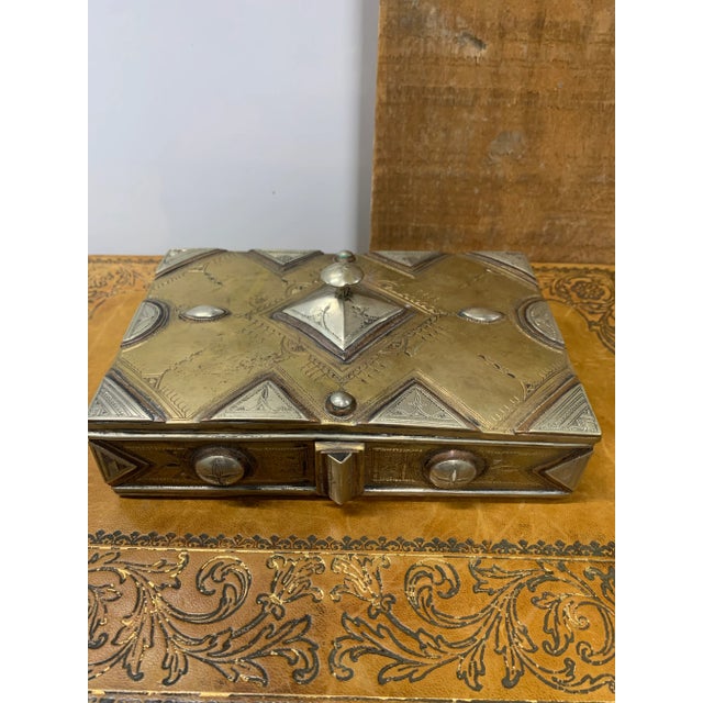 This is a beautiful handmade, hand tooled Metal box from the Tuareg people of Mali. The Tuareg are a Berber people with a...