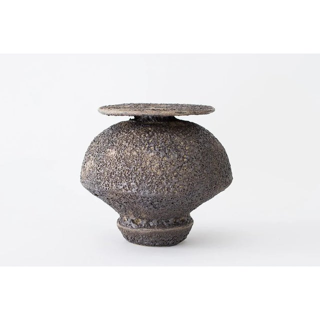 "Isolated n.18" stoneware vase by Raquel Vidal and Pedro Paz Dimensions: 21 x 23 cm Materials: Hand-sculpted, glazed...