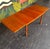 A classic, timeless Danish teak dining set with great size and proportions. Table possesses a drawleaf on either end to...