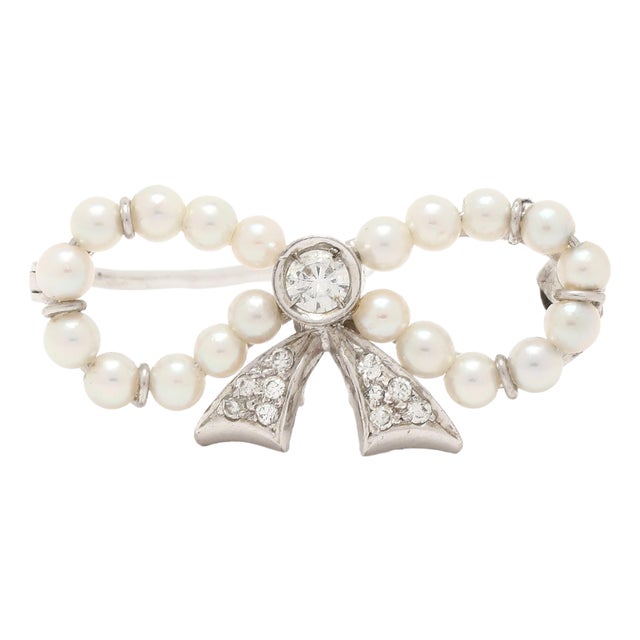 1950s 0.15ctw Diamond & Pearl Bow Brooch, 14k White Gold, Length 1 In For Sale
