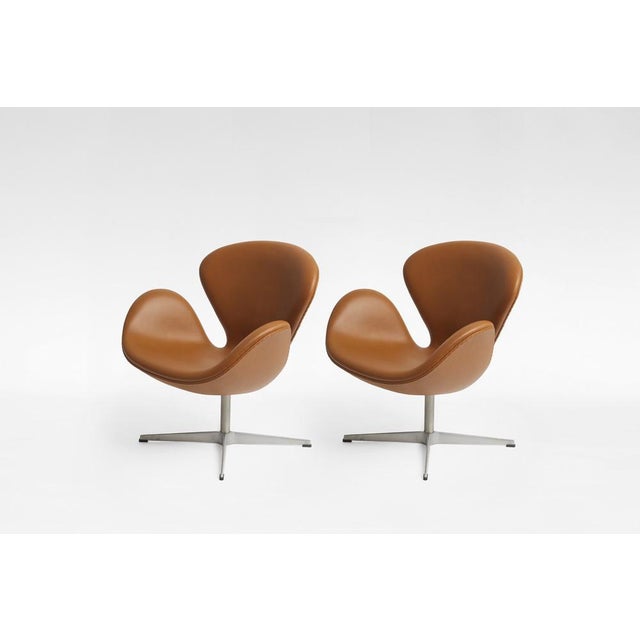 Vintage Swan Chairs (Model 3320) designed by Arne Jacobsen for Fritz Hansen, Denmark, in the 1950s. Upholstered in...