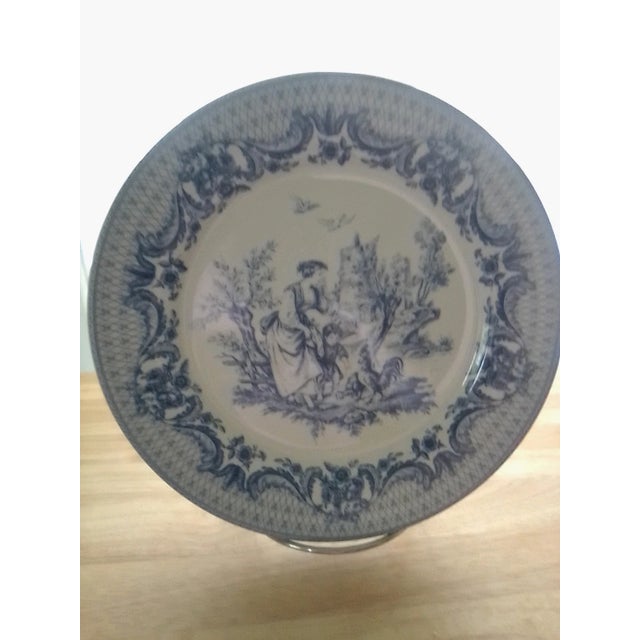 Add classic European charm to your table with this **Vintage Mid-Century Modern I. Godinger Blue Transferware “Courting...