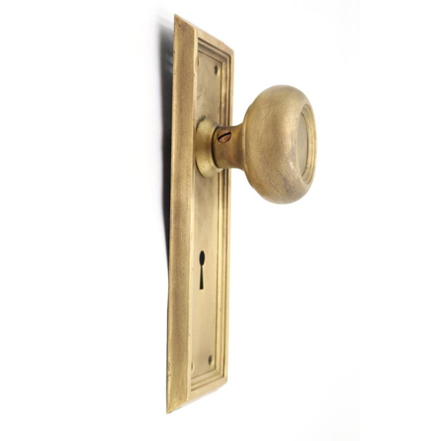 Concentric style dummy door knob set made of brushed brass. The original mounting screws are not available. Priced as one...