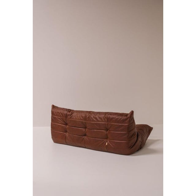 Vintage three-seater togo sofa designed by michel ducaroy for ligne roset. Originally introduced in 1973, the togo is one...