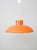 1960s-style pendant lamp in orange plastic with a ring-shaped metal insert and an integrated diffuser with concentric...