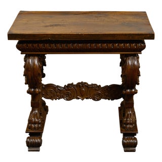 Italian 1800s Walnut Side Table with Lion Motifs and Richly Carved Trestle Base For Sale