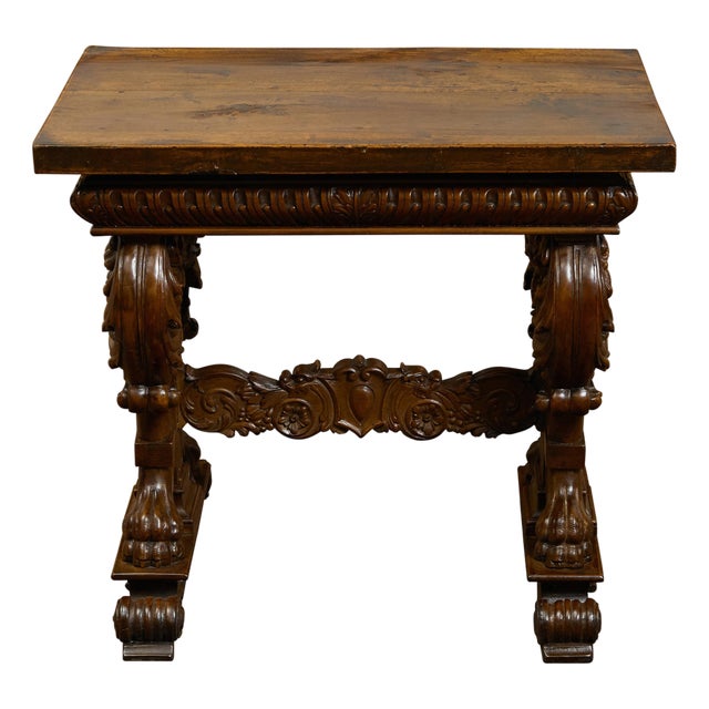 Italian 1800s Walnut Side Table with Lion Motifs and Richly Carved Trestle Base For Sale