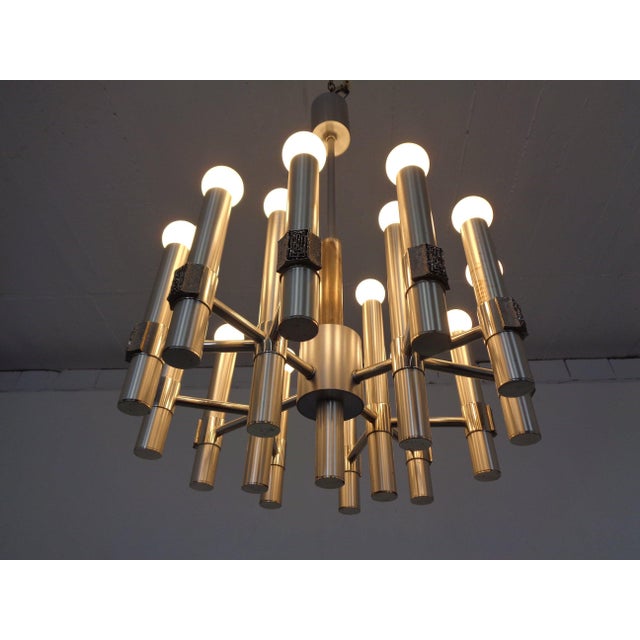Sculptural Angelo Brotto chandelier with 16 bulbs from the 1960s. The bulbs are part of the offer. I have official proof...
