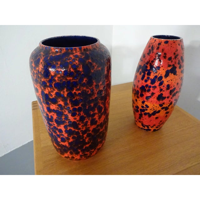 Two big lava ceramic vases by Scheurich. Referred to on the bottom with W. Germany, 546-40 & 248-38. Selective chipping at...