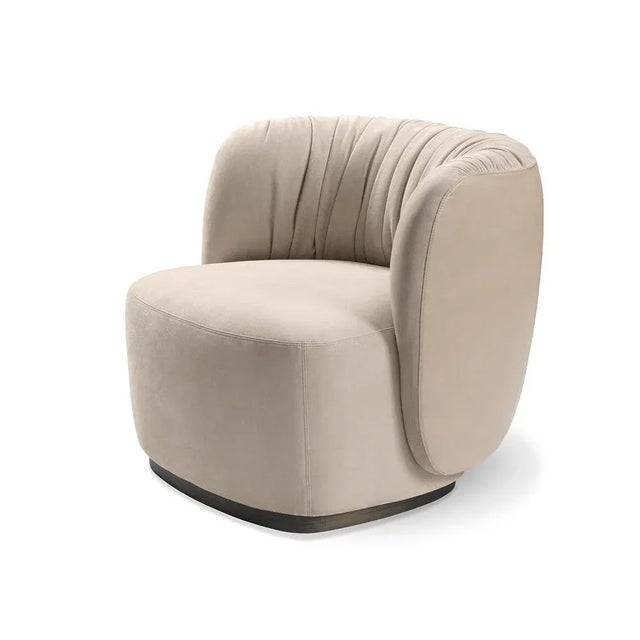 The curtains ("sipari" in Italian) in theaters inspired the characteristic creased look of this armchair backrest, the...