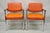 Vintage Mid Century Modern Orange Naugahyde Chrome Frame Arm Chairs by Malibu - a Pair. Item features chrome metal frame,...