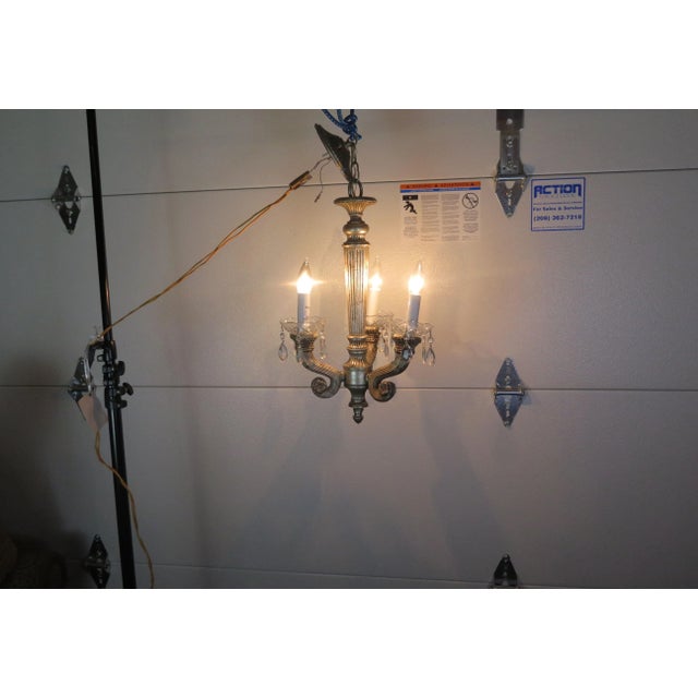 I silver leafed this chandelier in the traditional Italian way, used for centuries by roman gilders and artisans. I...