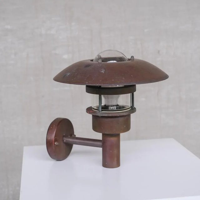 Danish Copper and Glass Patinated Wall Light, in Good conditions. Designed 1990 to 1999 UK Plug (up to 250V).The wiring of...