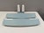 Bathroom lamps with matching shelves in light delicate blue porcelain. Designed by Sigvard Bernadotte for IFÖ Sweden...