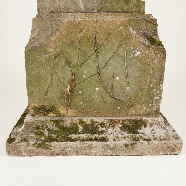 An elegant cast stone garden basin, attributed to England and dating from the early 20th century, circa 1900-1930....