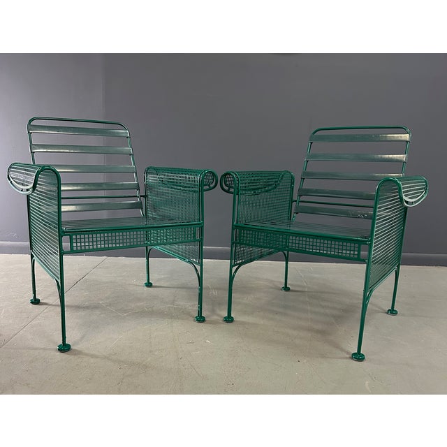 Unusual and expertly crafted by Woodard in the iconic style of Josef Hoffman, these metal lounge chairs bring...