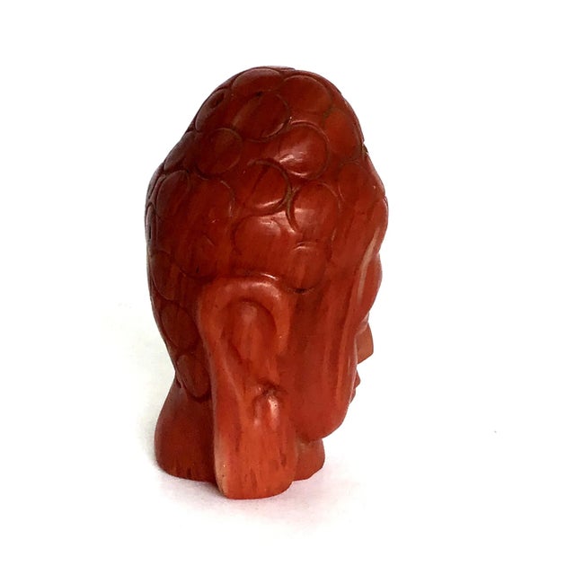 The colors are magnificent in this stone hand carved Buddha Head. Use it on your desk for a paper weight or in your...