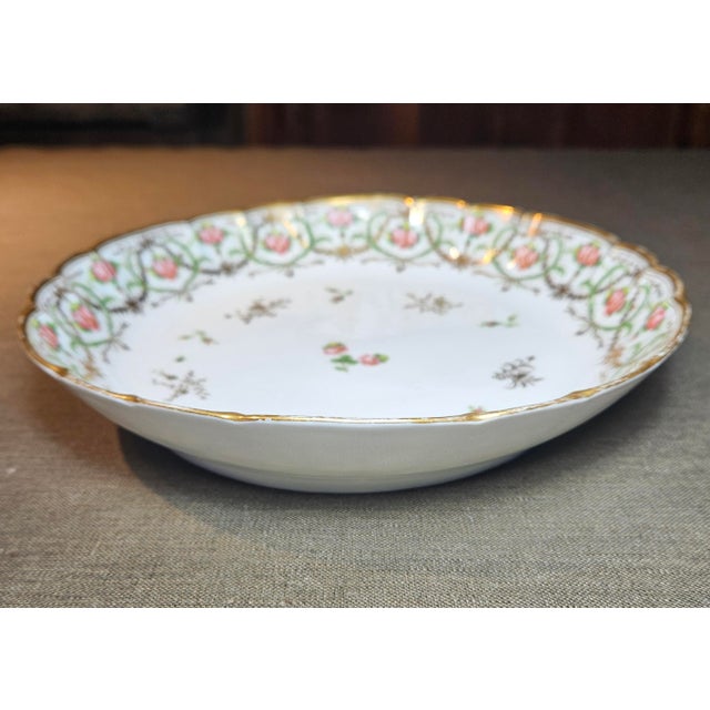 This stunning and rare Paris Porcelain serving bowl, marked NAST, likely dates from around 1800 to 1830. Gently used but...