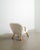 A rare and iconic danish mid century "clam chair" in natural stained beech wood and white sheepskin designed by arnold...