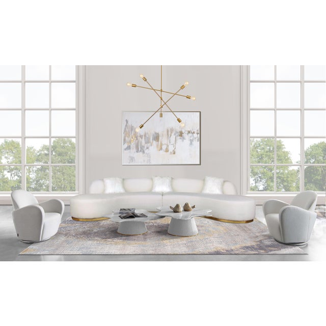 Give your living room décor an extravagant finishing touch with this Simona round Coffee Table. Sleek round base is...