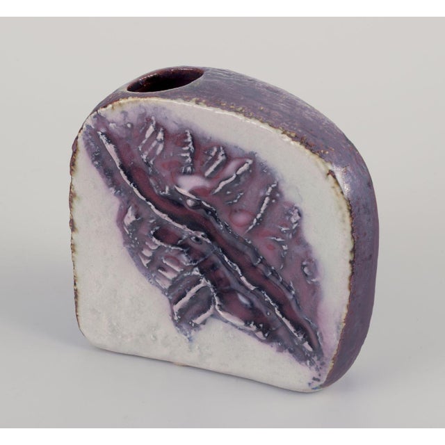 Carl Harry Stålhane (1920-1990) for "Designhuset", Sweden. Unique stoneware vase. Unusual shape. Abstract motif in purple...