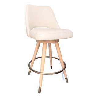Interlude Home Cream Leather Swivel Counter Stool With Light Wood Legs For Sale