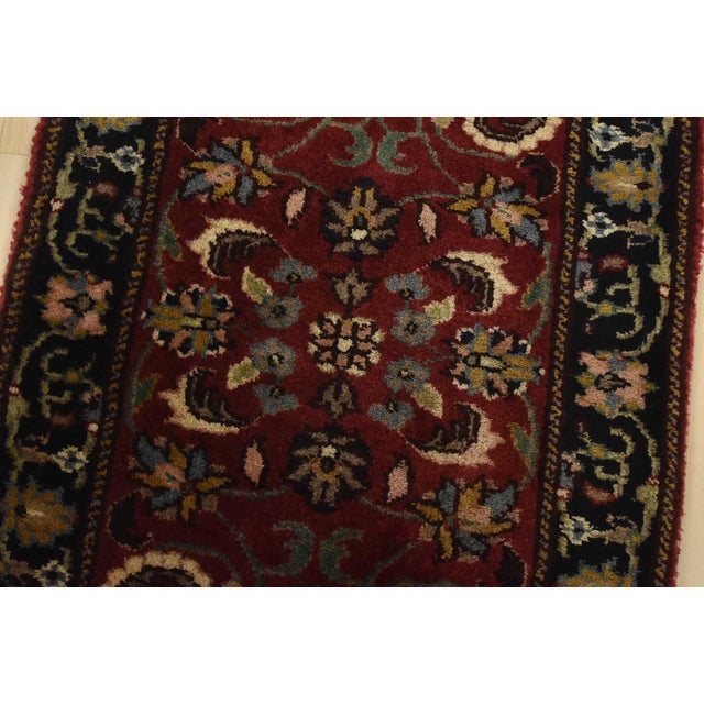 An authentic vintage traditional Agra rug hand-knotted with an all-wool pile on a cotton foundation. This oriental rug...