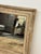 Design Plus Gallery presents a Pine Wood Wall Mirror. The rustic mirror has a distressed appearance and may be an antique...