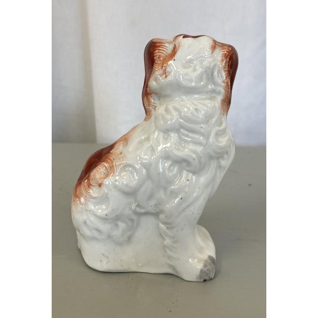 This small Staffordshire Terrier may have once belonged to a pair but is now all alone. Purchased at an estate sale it...