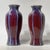 Pair of vintage hexagonal shaped ceramic vases with lovely violet purple flambe glaze. Each 13 1/2 inches tall and in good...