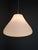 Elegant midcentury modern pendant light produced in czechoslovakia during the 1970s. The lamp combines opaline glass with...